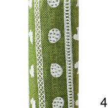 Štyri rolky juty s veľkonočnými motívmi v rôznych farbách.