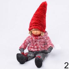 Textilné dekorácie chlapec a dievča s červenými čiapkami.