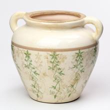 Keramický obal s ušami v zelenom vzore.