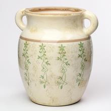 Keramický obal s ušami v zelenom vzore.