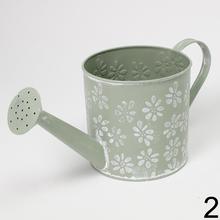 Malé kovové vázy v tvare krhly v mixe farieb.