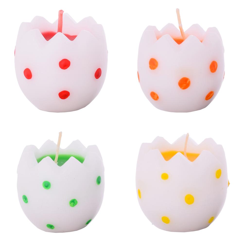 Veľkonočné sviečky vo forme vajec s bodkami v mixe farieb.