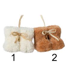 Záves papučky v krémovej a hnedej farbe s mašľou.