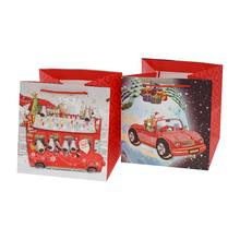 Darčeková taška s vianočným motívom a glitrami.