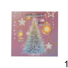 Darčeková taška s vianočnými motívmi a glitrami.