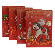 Darčeková taška na Vianoce v červenej farbe s motívom Santa Clausa a vianočných ozdôb.