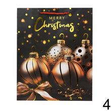 Darčeková taška na Vianoce v čiernej farbe s mixom dekorácií.