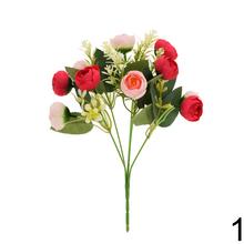 Kytica ranunculus s mixom zelene a kvetov.