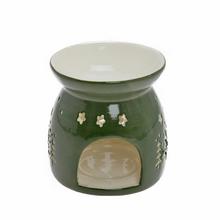 Čierna aromalampa s vzorom stromčekov a hviezd.