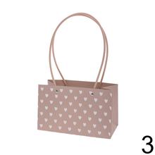 Taška srdce s červenými a ružovými srdiečkami.