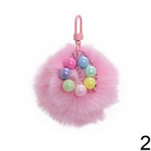 Prívesok chlpáč v rôznych farbách s guľôčkami.