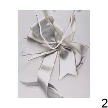 Darčeková taška s mašľou v rôznych farbách.