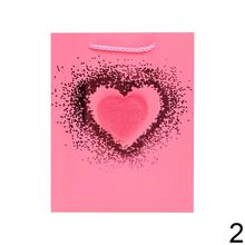 Darčeková taška s motívom srdca v rôznych farbách.