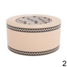 Smútočná stuha s čiernym vzorom.