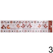 Vianočná fólia na okná s vtáčikmi a darčekmi.