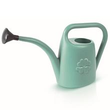 Zelená krhľa s sitkom a kvetinovým vzorom.