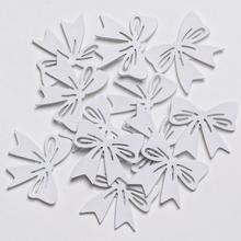 Drevené biele mašle na dekoráciu, balenie 12 kusov.