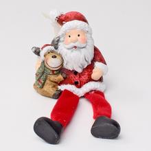 Vianočná dekorácia Santa Ker s sobom.