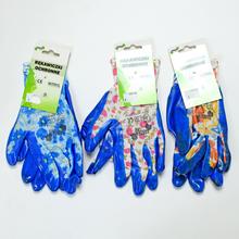 Pracovné rukavice č.9 s modrým vzorom.