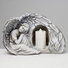 Smutný anjel s LED sviečkou, sivý, polyres, 21x10x13,5 cm.