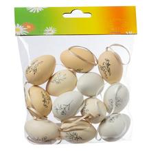 Sada plastových vajíčok s kvetinovým vzorom.