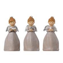 Súprava troch dekoratívnych anjelov s knihou, sviečkou a krížom.