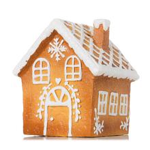 Keramický domček z perníka s bielou polevou.