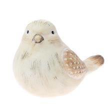 Keramický vtáčik s jemnými detailmi.