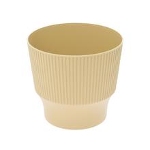 Okrúhly obal na kvety v béžovej farbe.