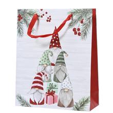 Vianočná papierová taška s glitrami a motívom Mikulášov.