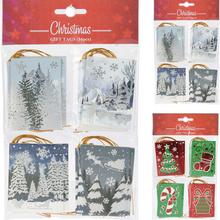 Sada vianočných štítkov na darčeky s rôznymi motívmi.