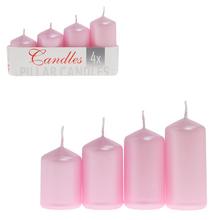 Sada štyroch ružových adventných sviečok.