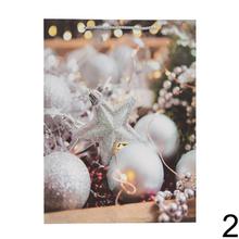 Darčeková taška s vianočným motívom a glitrami.