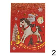 Darčeková taška na Vianoce v červenej farbe s motívom Santa Clausa a vianočných ozdôb.