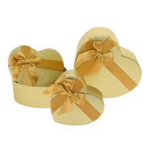 Darčekové krabičky v tvare srdca, zlaté matné, s mašľou.