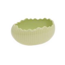 Zelený porcelánový obal v tvare škrupiny vajca.