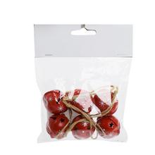 Sada červených rolničiek s bielymi hviezdami a čiernymi hviezdami, balené v priehľadnom obale.