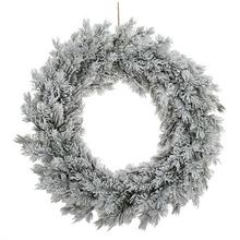 Vianočný veniec z čečiny so zasneženými šiškami.