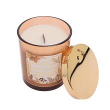 Voňavá sviečka Good Moments v sklenenom obale.