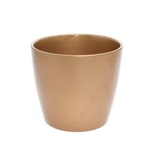 Keramický kvetináč v zlatej farbe.