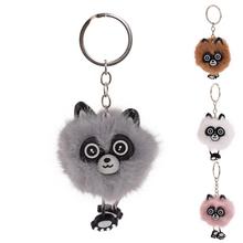 Kľúčenka zvieratko s plyšovým vzhľadom.