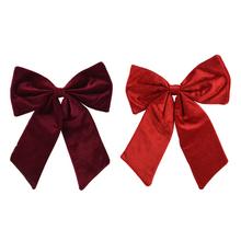 Červené mašle z polyesteru, 2 rôzne varianty.