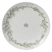 Tanier s vianočným venčekom a striebornými korálkami.