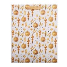 Vianočná taška s motívom zlatých ozdôb.