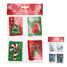 Sada štítkov na darčeky s vianočnými motívmi.