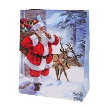 Veľká vianočná taška s motívom Santa Clausa a sobov.