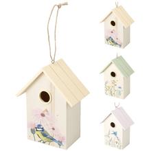 Búdka pre vtáky z dreva s farebnými motívmi.