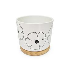 Kvetináč Oslo s kvetinovým vzorom a dreveným podstavcom.