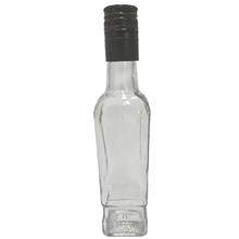 Pevná fľaša na alkohol alebo whisky s objemom 250 ml a zlatým uzáverom.