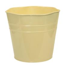 Žltý plechový obal s octagonálnym tvarom.